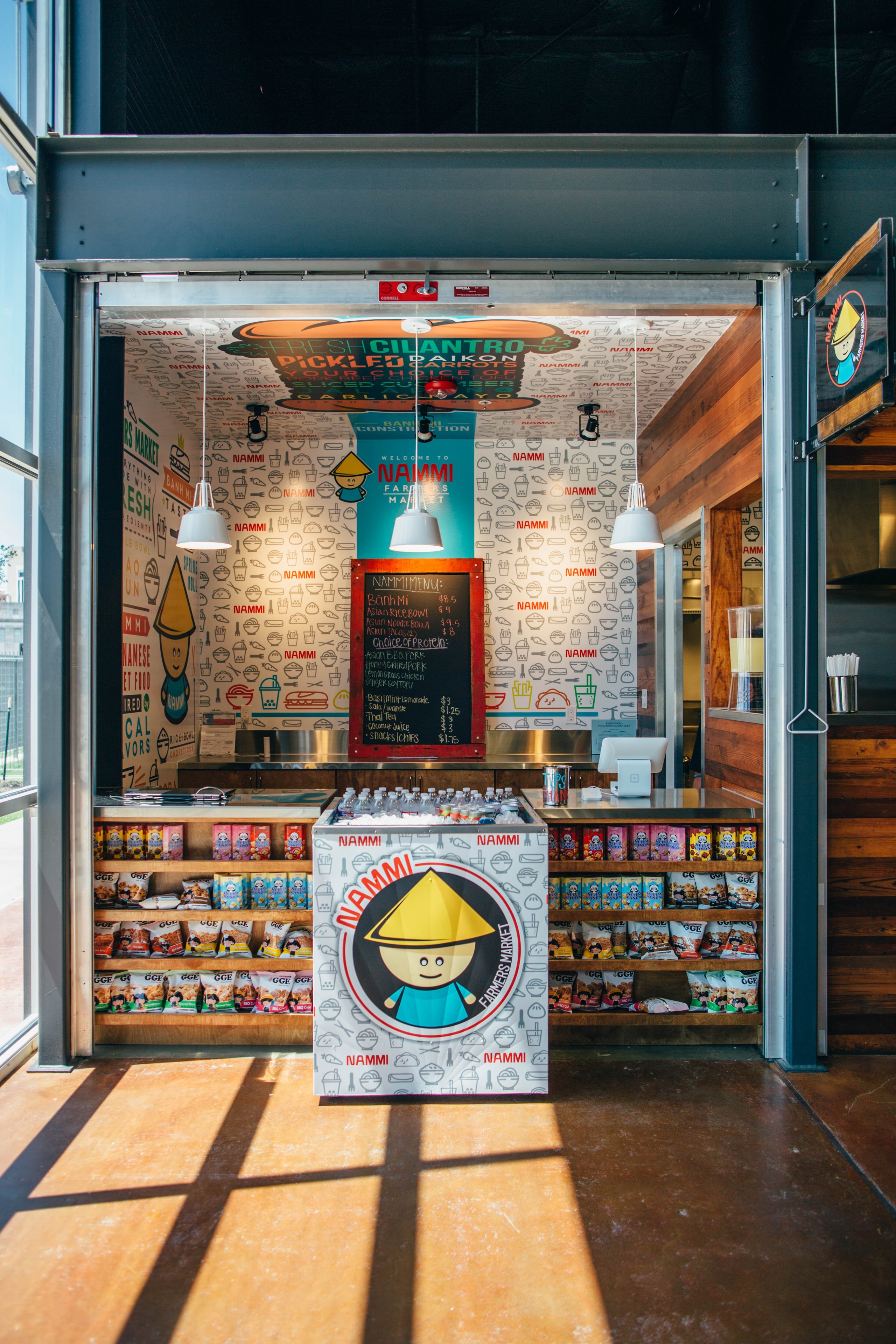 Nammi Farmers Market Vietnamese food kiosk full branded wrap with custom wall graphics by Architectural Wraps Dallas