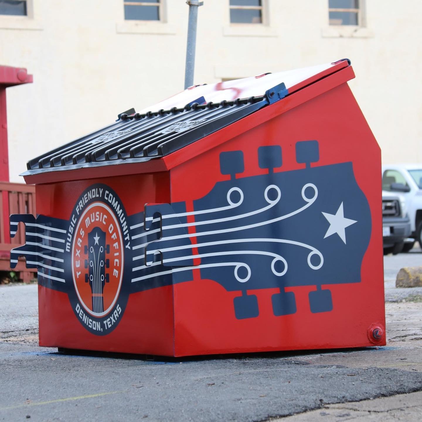 City of Denison Texas Music Office guitar-shaped utility box exterior wrap by Architectural Wraps