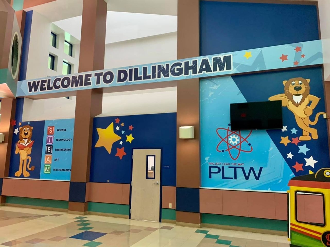 Dillingham STEM school lobby wall wrap with STEAM mascot and PLTW branding by Architectural Wraps Sherman TX