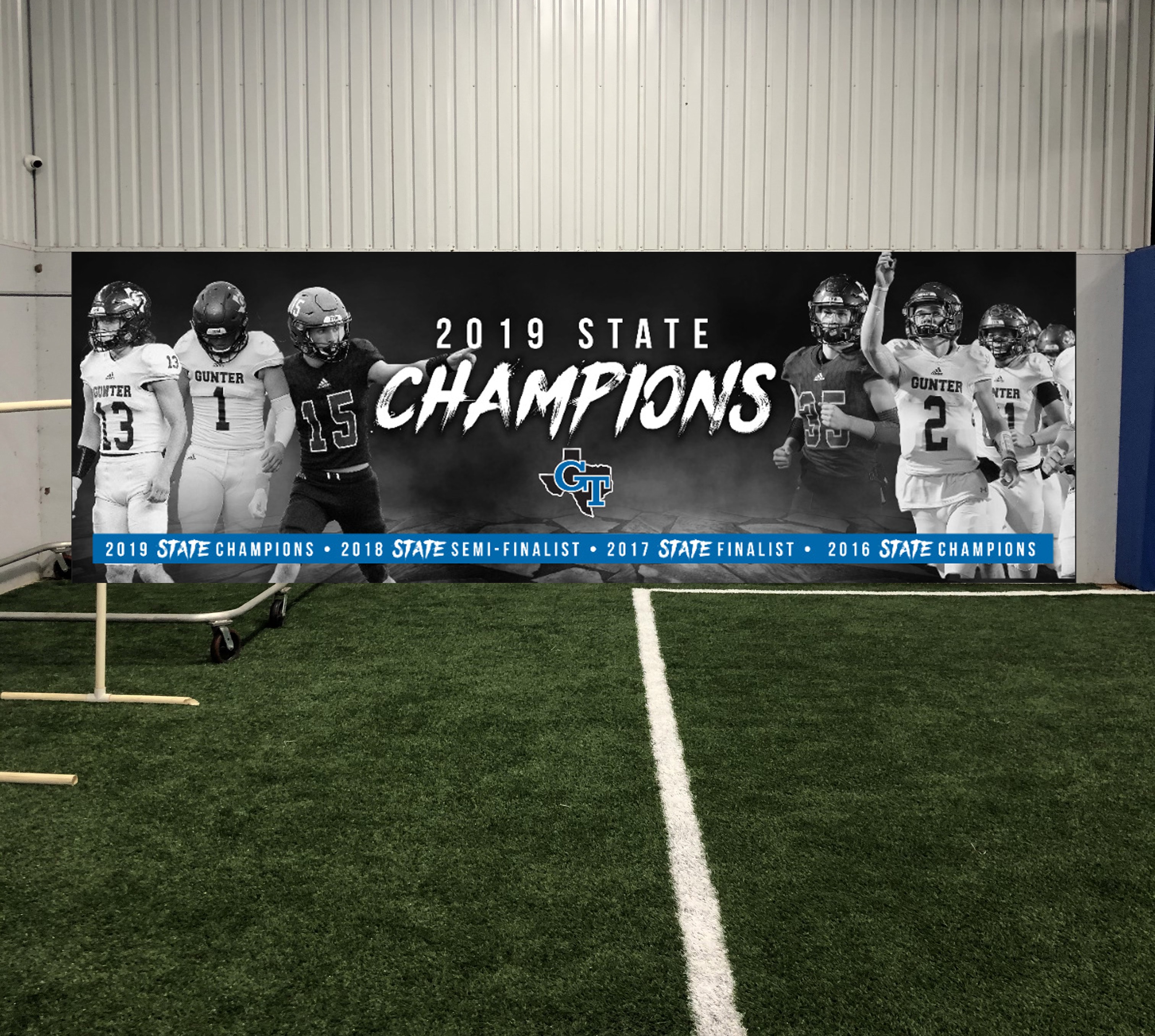 Gunter Tigers 2019 State Champions football large-format wall mural inside indoor practice facility by Architectural Wraps