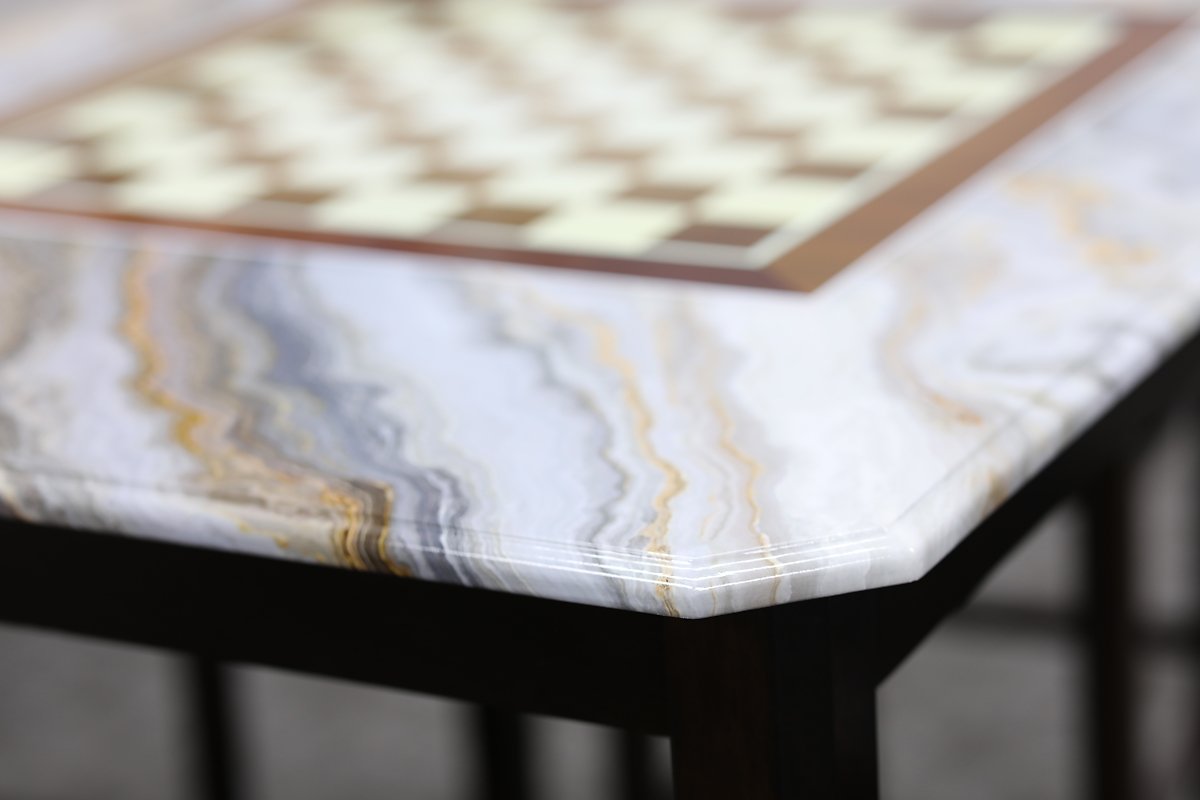 Table surface vinyl wrap marble finish by Architectural Wraps furniture renovation North Texas